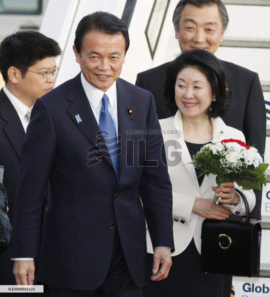 PM Aso arrives in Berlin