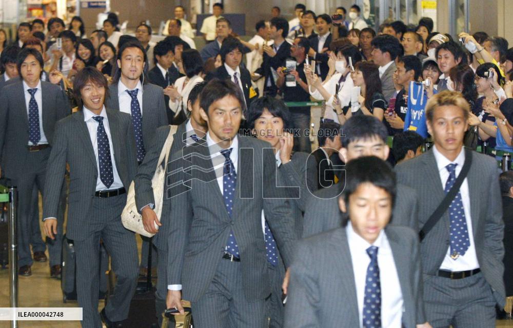 Jubilant Japan return home
