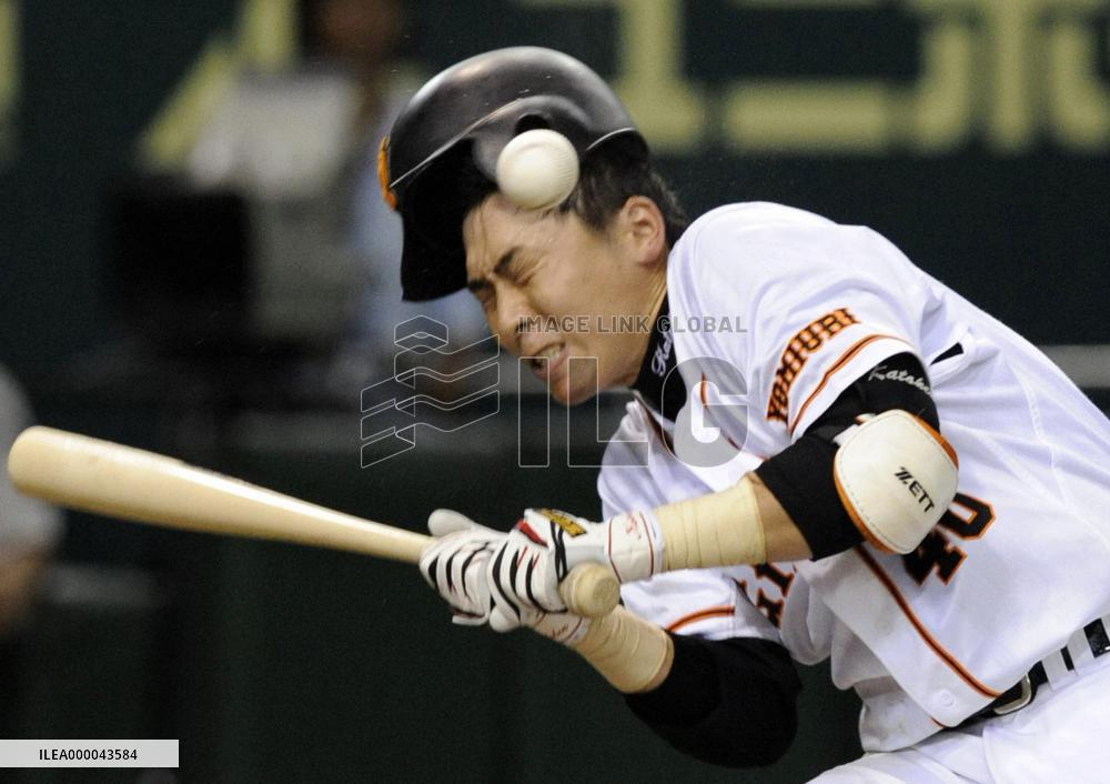 Yomiuri's catcher Kato hit by pitch