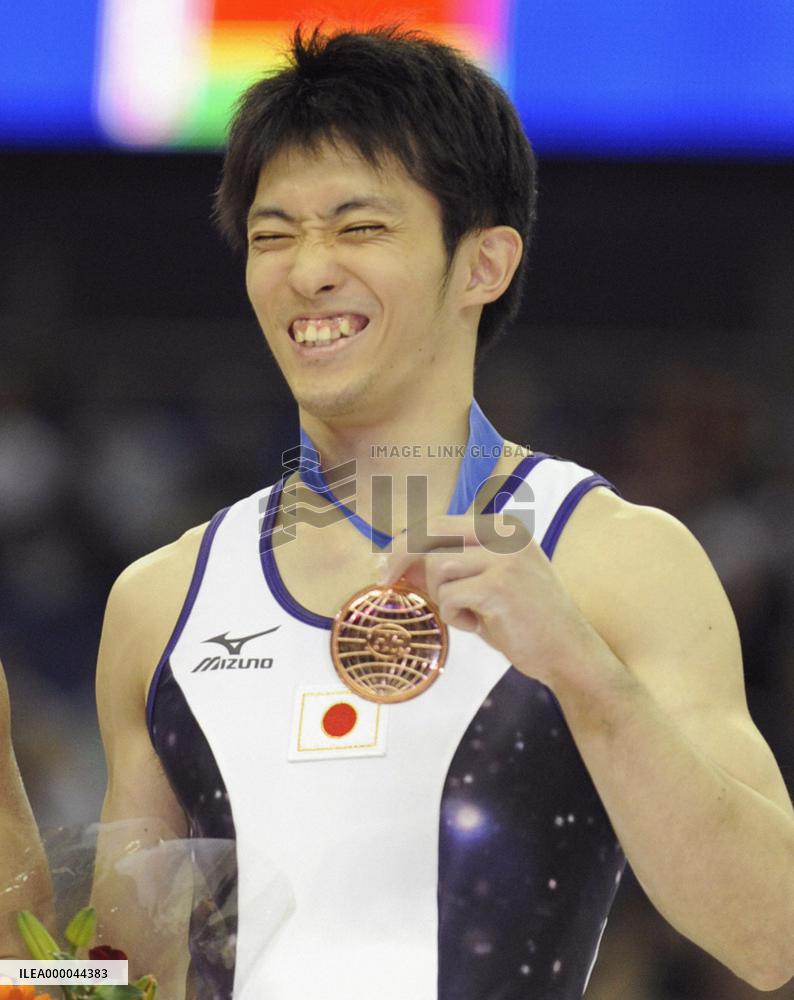 Tanaka wins bronze in parallel bars at world championships