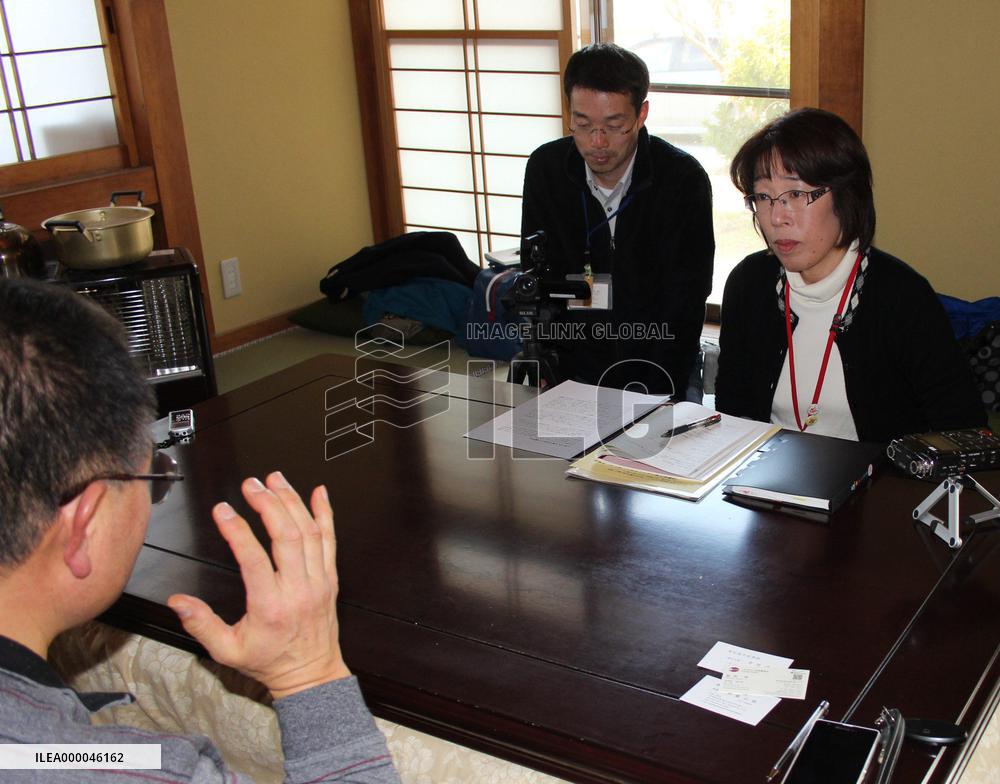 Tsunami-hit city library compiles victims' memoirs in English