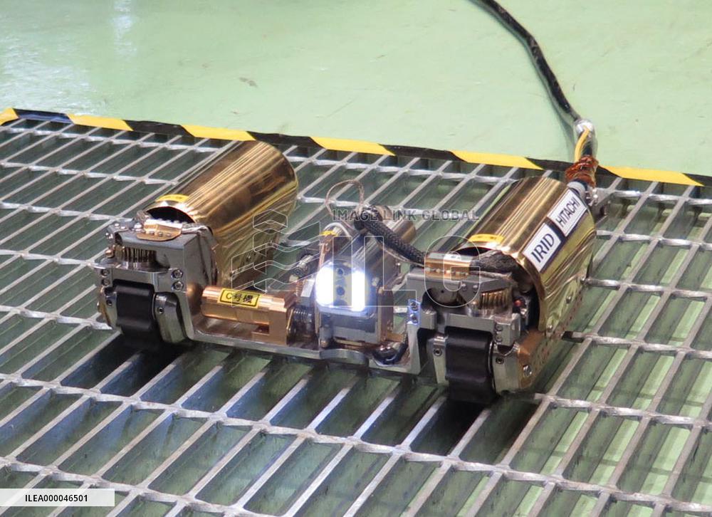 Remote-controlled robot to probe crippled Fukushima reactor vessel