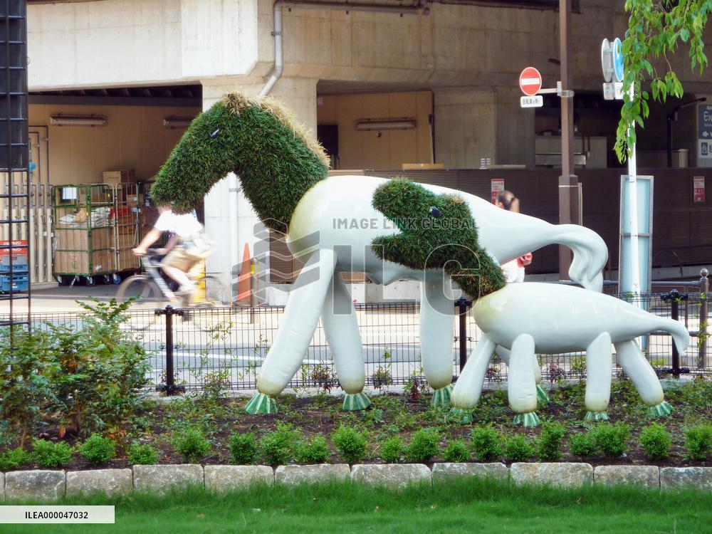 Images of radish-like horses on display in Tokyo sculpture garden