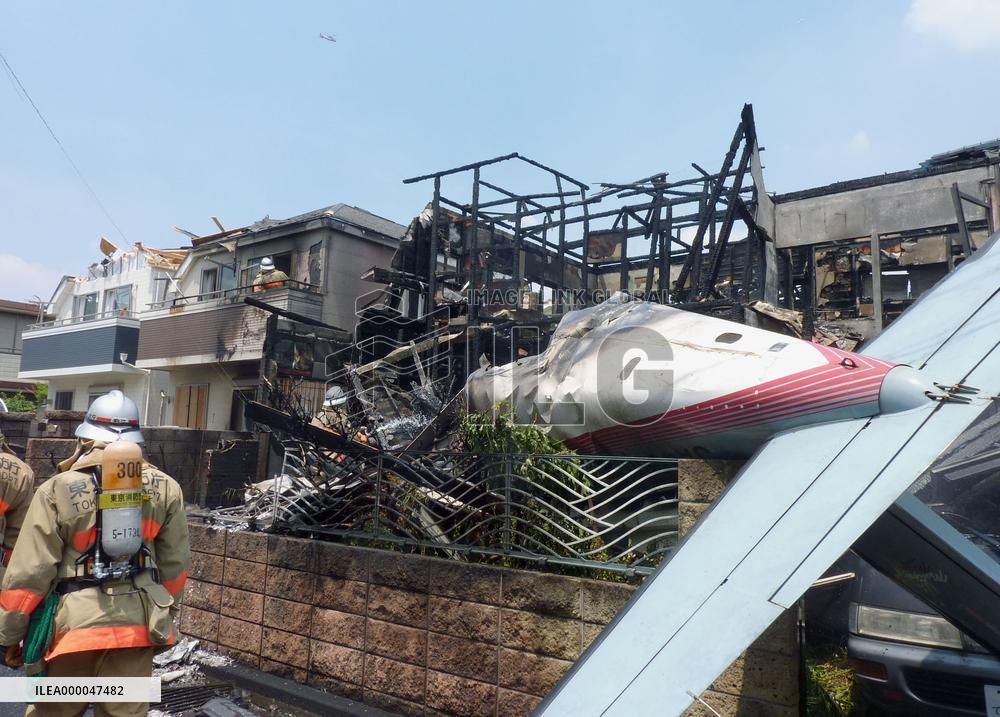 3 killed as small plane crashes into homes in Tokyo suburbs