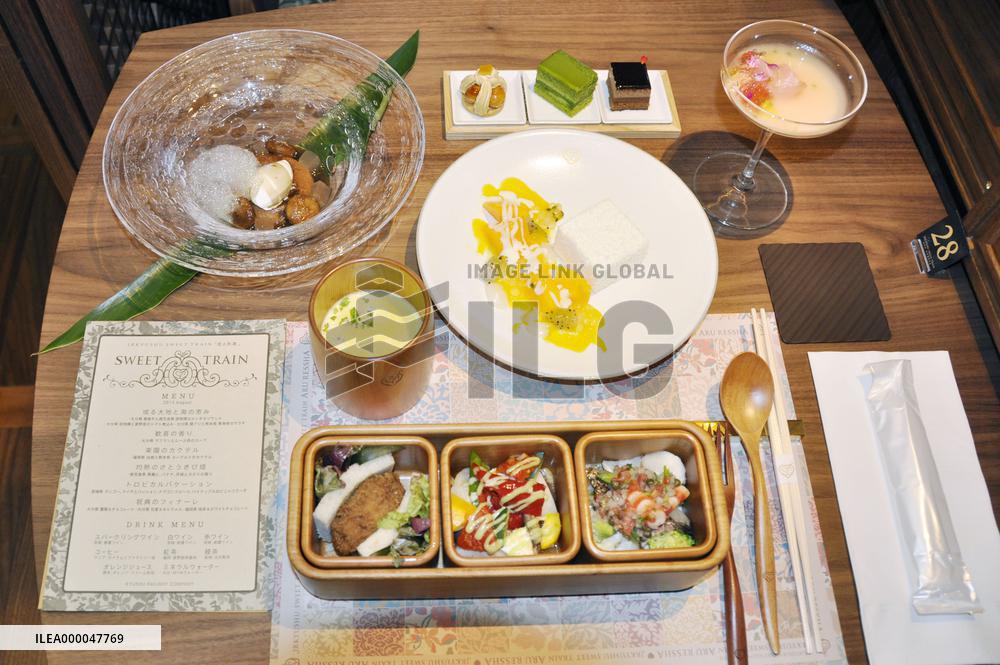 Kyushu Railway serves light meal, sweets on luxury train trip