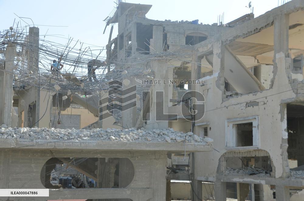 Bomb-ravaged buildings lie neglected in Gaza
