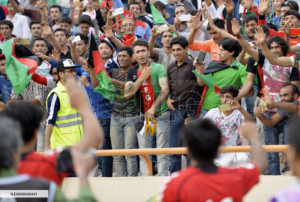Afghans cheer own soccer team in World Cup qualifier against Japan