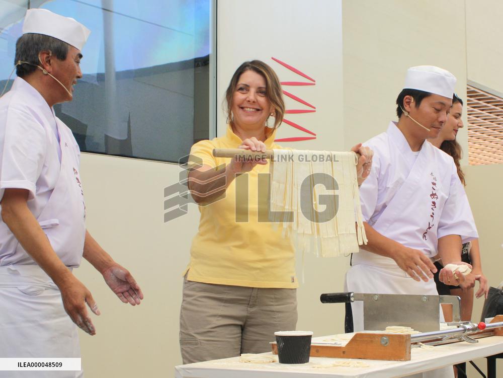 Woman making "Sanuki udon" noodles at Milan Expo Japan Pavilion