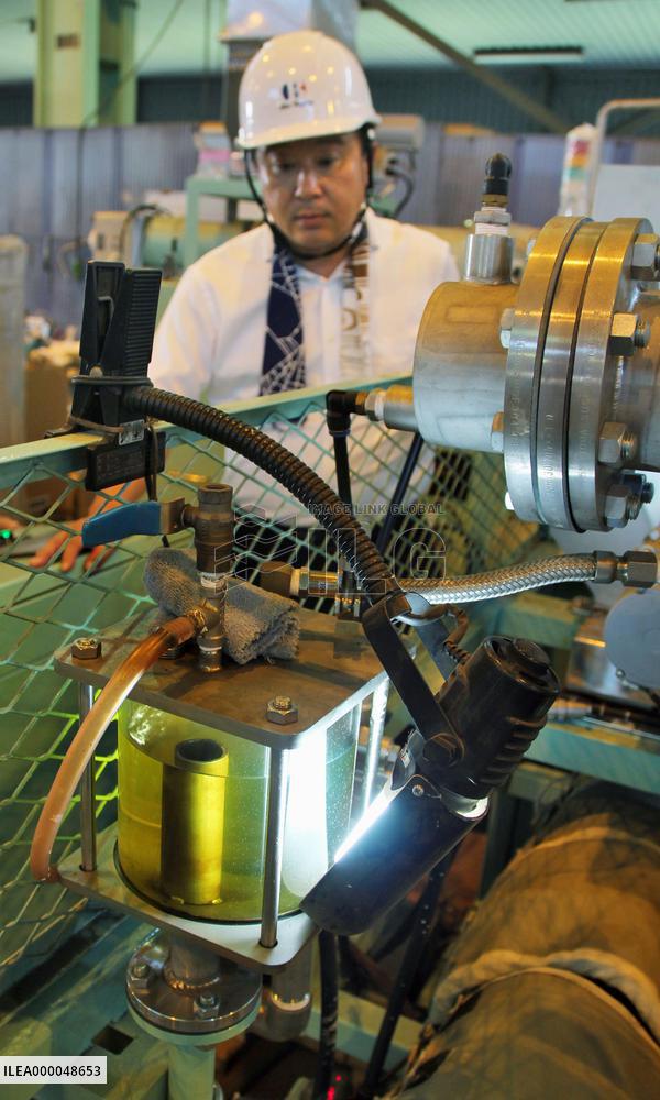 Hiratsuka firm's device turns waste plastics to oil