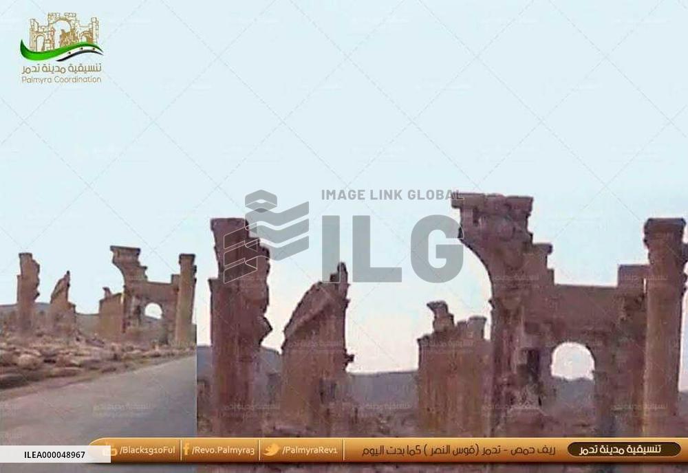 Image of Palmyra's Arch of Triumph wrecked by IS