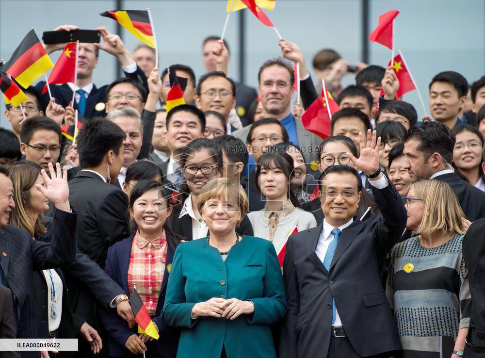 Merkel visits Chinese university in Premier Li's home province