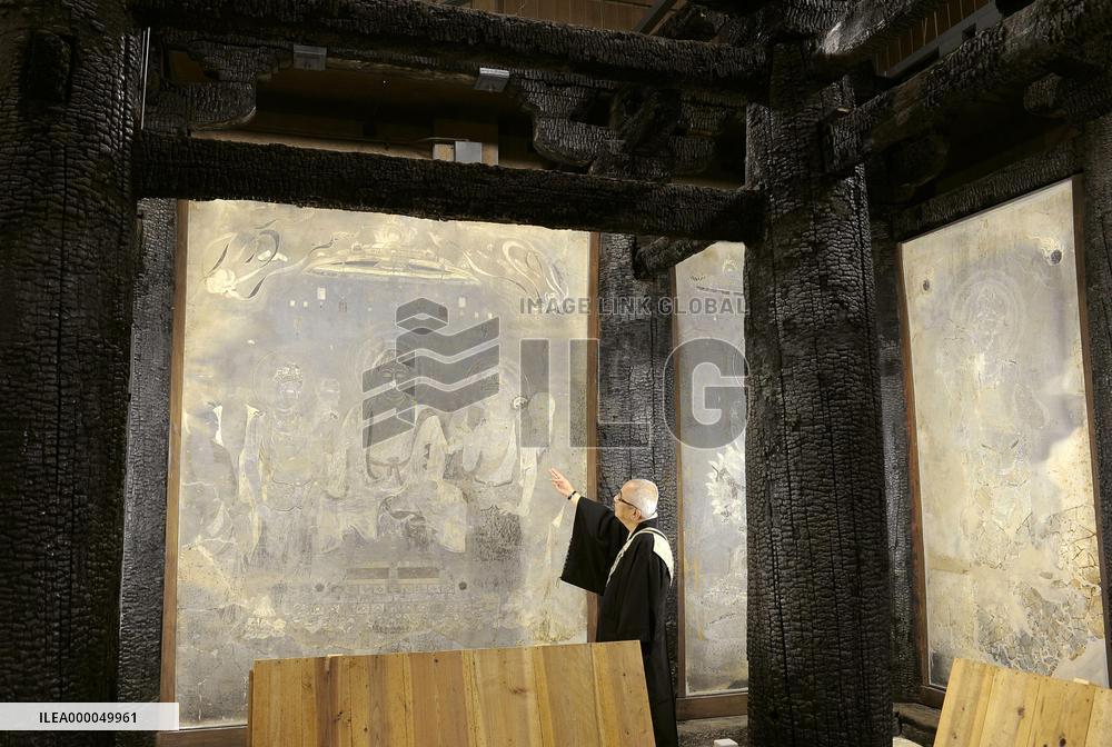 Scorched temple murals unveiled before survey for preservation