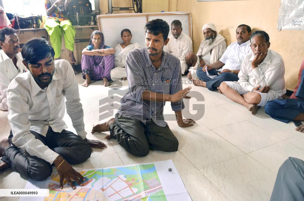 Evicted suburban Mumbai slum dwellers discuss their future