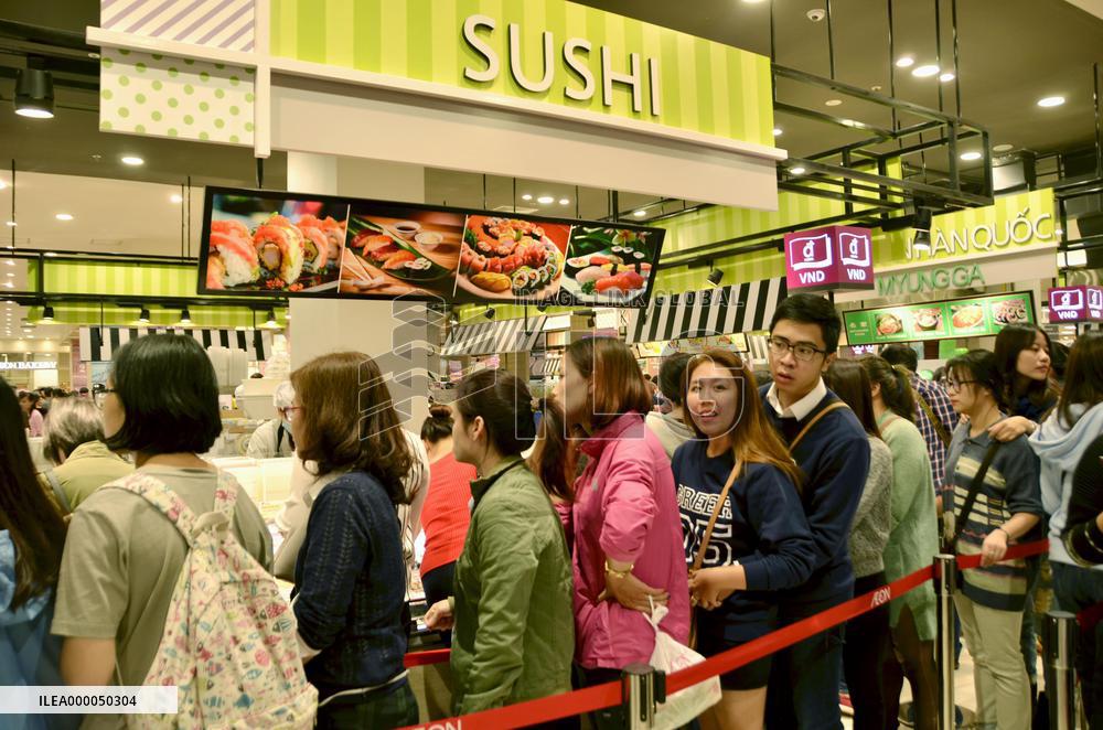 Customers swarm shopping mall in Hanoi run by Japanese retailer AEON