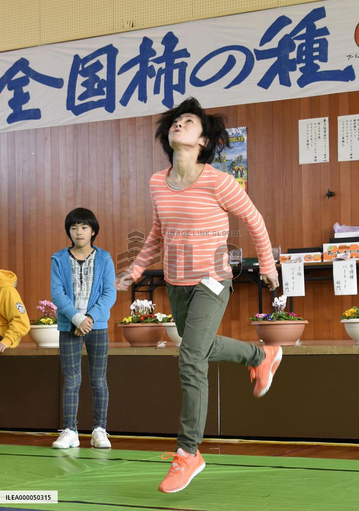 Persimmon seed-spitting contest held in western Japan