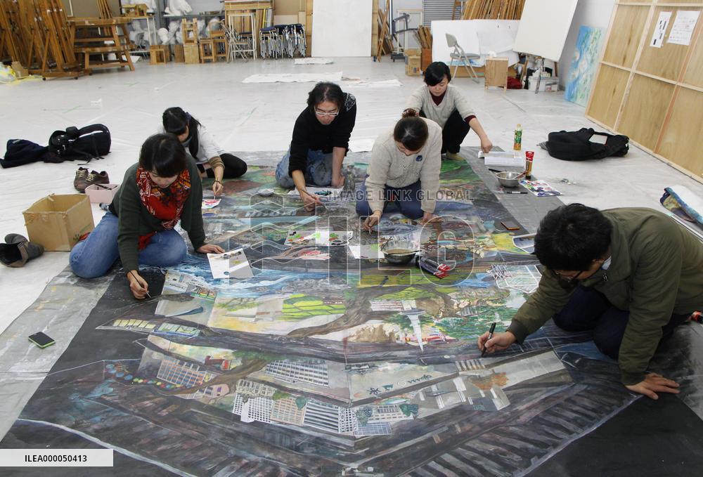 Students seek to show "Tohoku" in unique painting of northern Japan