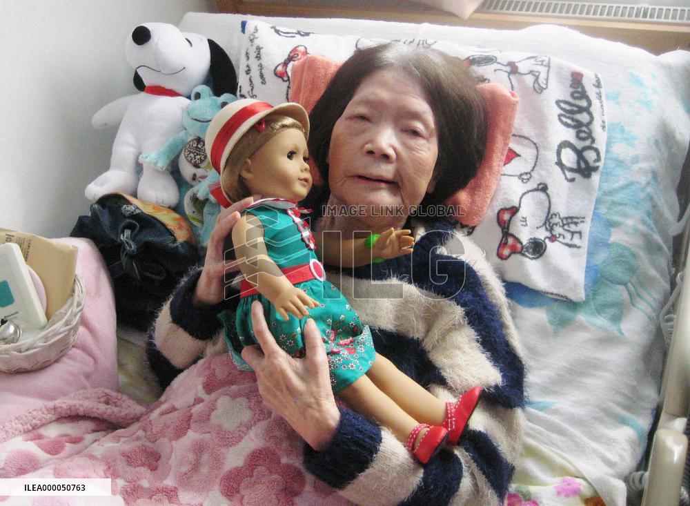 Woman receives doll from Kennedy in return for gift 50 yrs ago