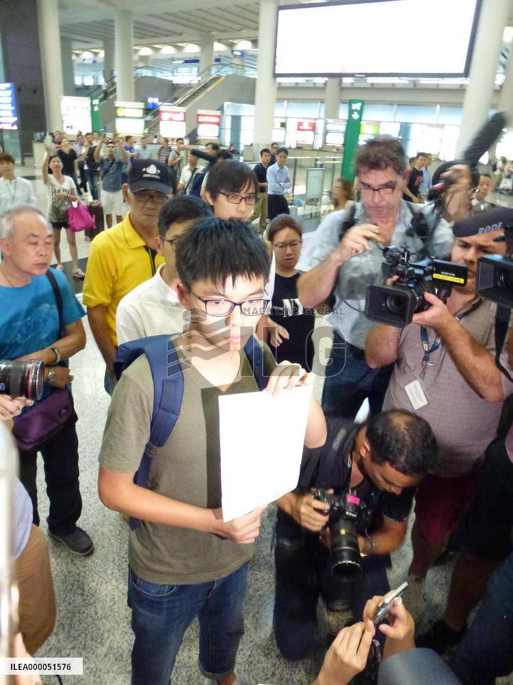 H.K. student activist Joshua Wong returns after detention in Thailand