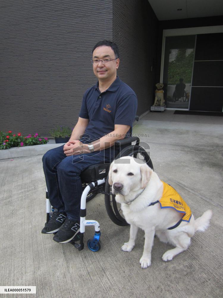 FEATURE: Service dog user hopes every dog has its day