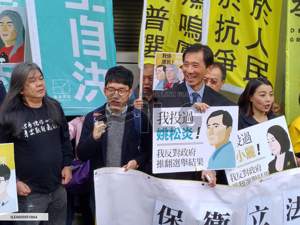 4 pro-democracy lawmakers appear at disqualification hearing in H.K.