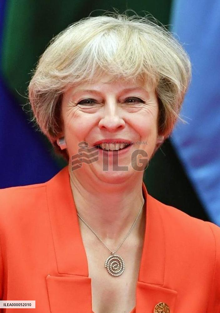 May signals Britain will pursue "hard Brexit"