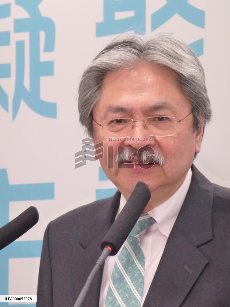 H.K. leadership hopeful Tsang urges security legislation, tax reform