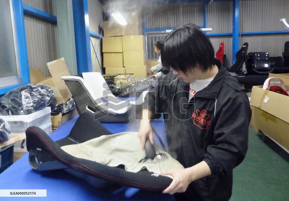 Japan firm aims to be a top car seat maker