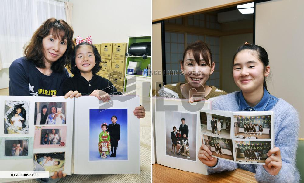 Families in tsunami-hit town then and now
