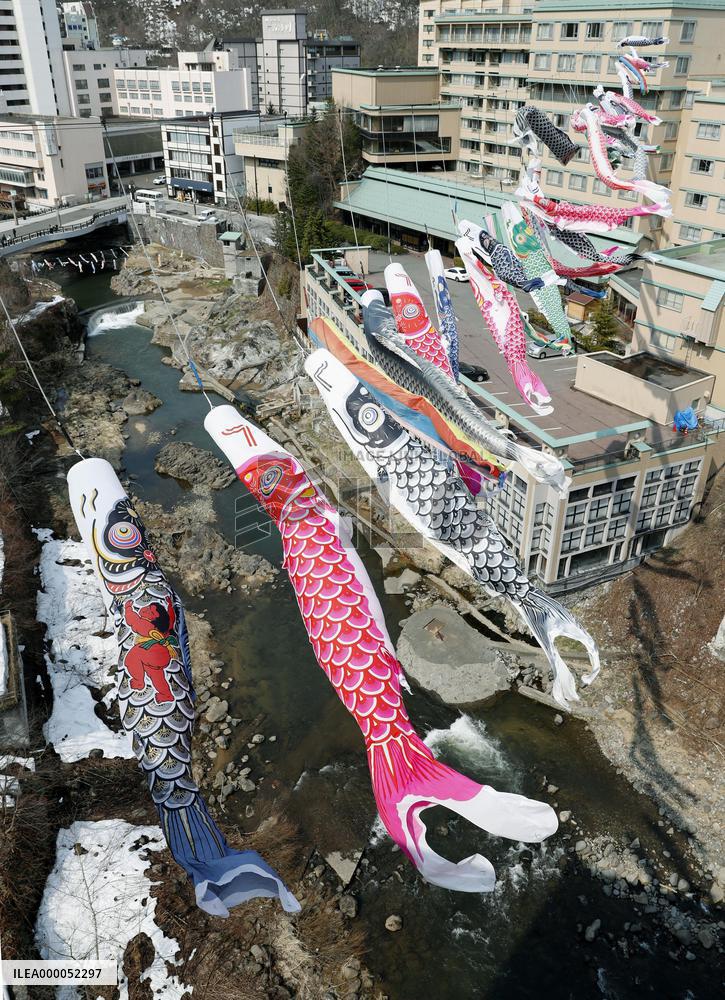 Carp streamers displayed over Sapporo river ahead of Children's Day