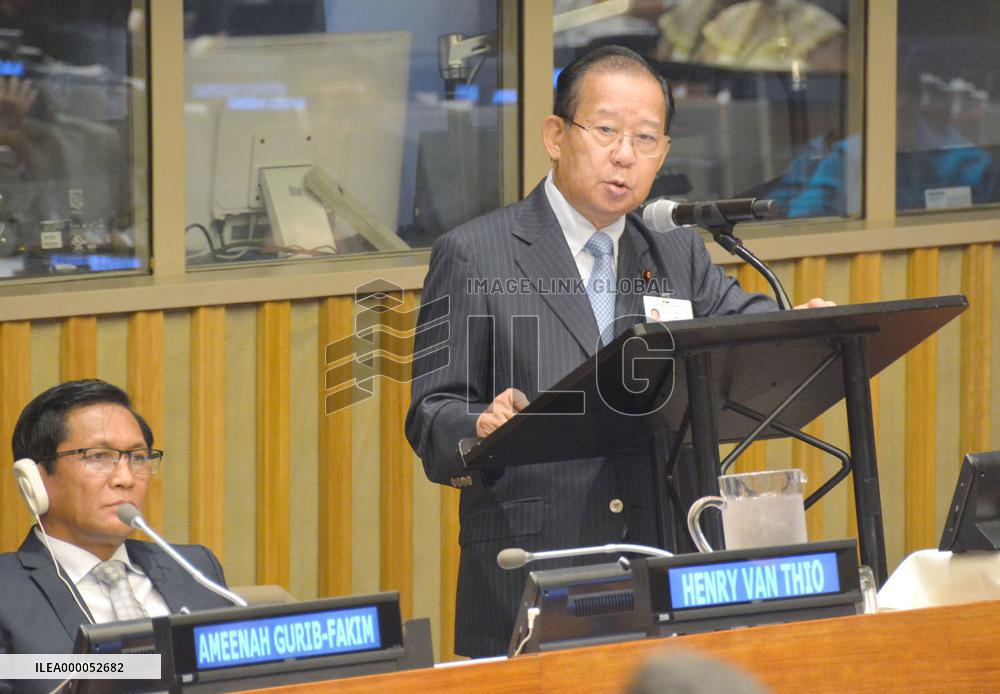 CORRECTED: Japan promises to help world cope with water-related disasters