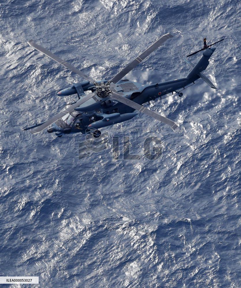 Search for crew members continues after ASDF chopper crash