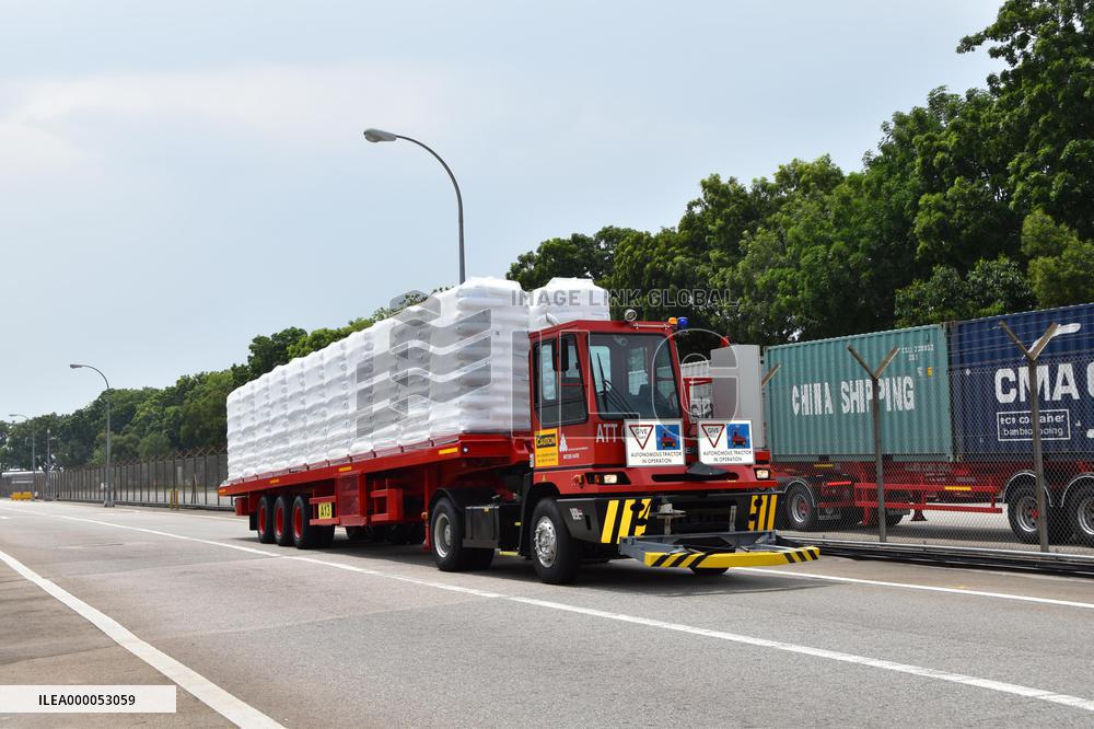 Driverless truck begins goods delivery at Singapore plant