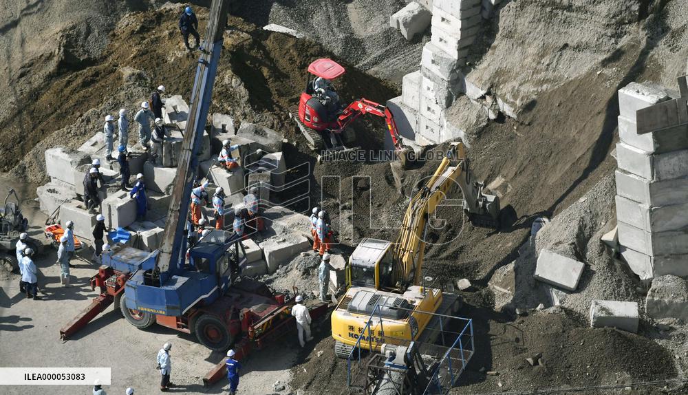 Two workers buried in landslide at quarry in western Japan
