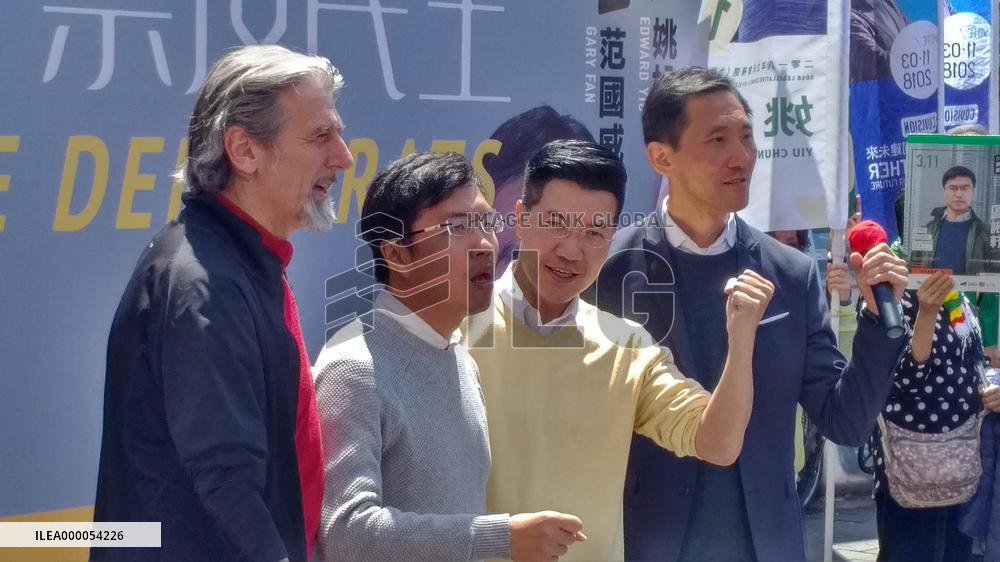 H.K. legislative by-election pro-democracy candidates seek votes