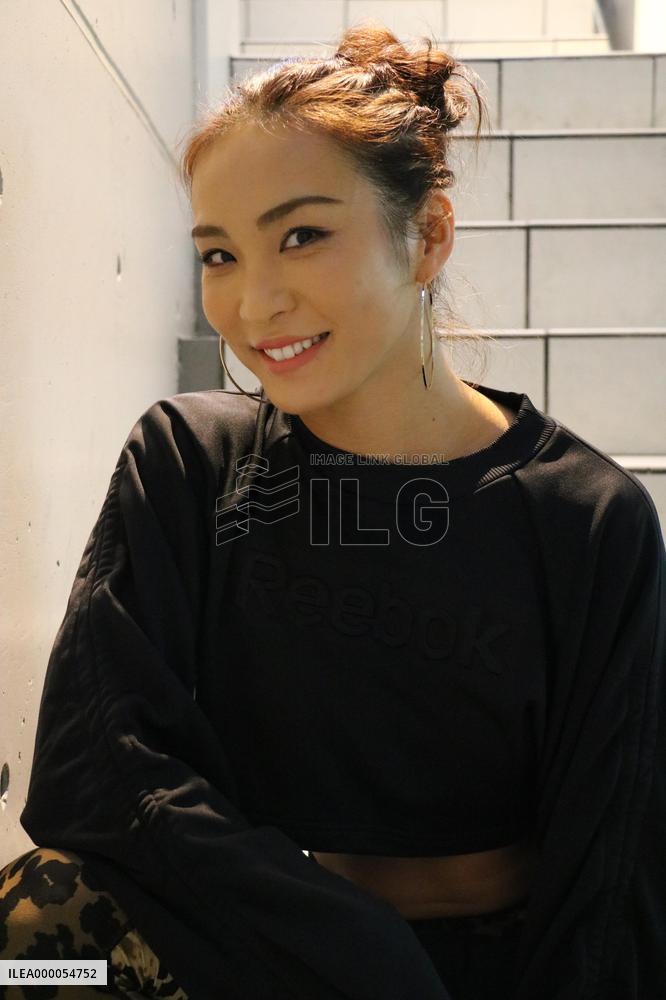 Six-pack queen goes full burn to revolutionize fitness in Japan