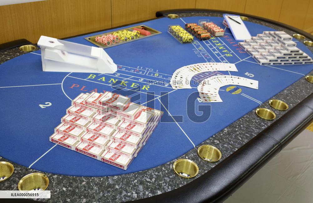CORRECTED: 13 workers arrested at illegal casino in Japan