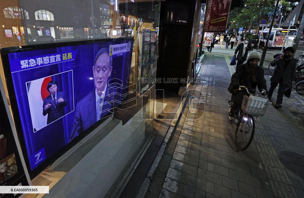 Japan extends virus emergency for Tokyo and other regions