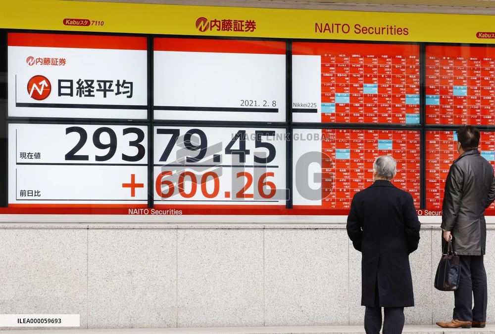 Tokyo stocks surge amid U.S. stimulus hopes