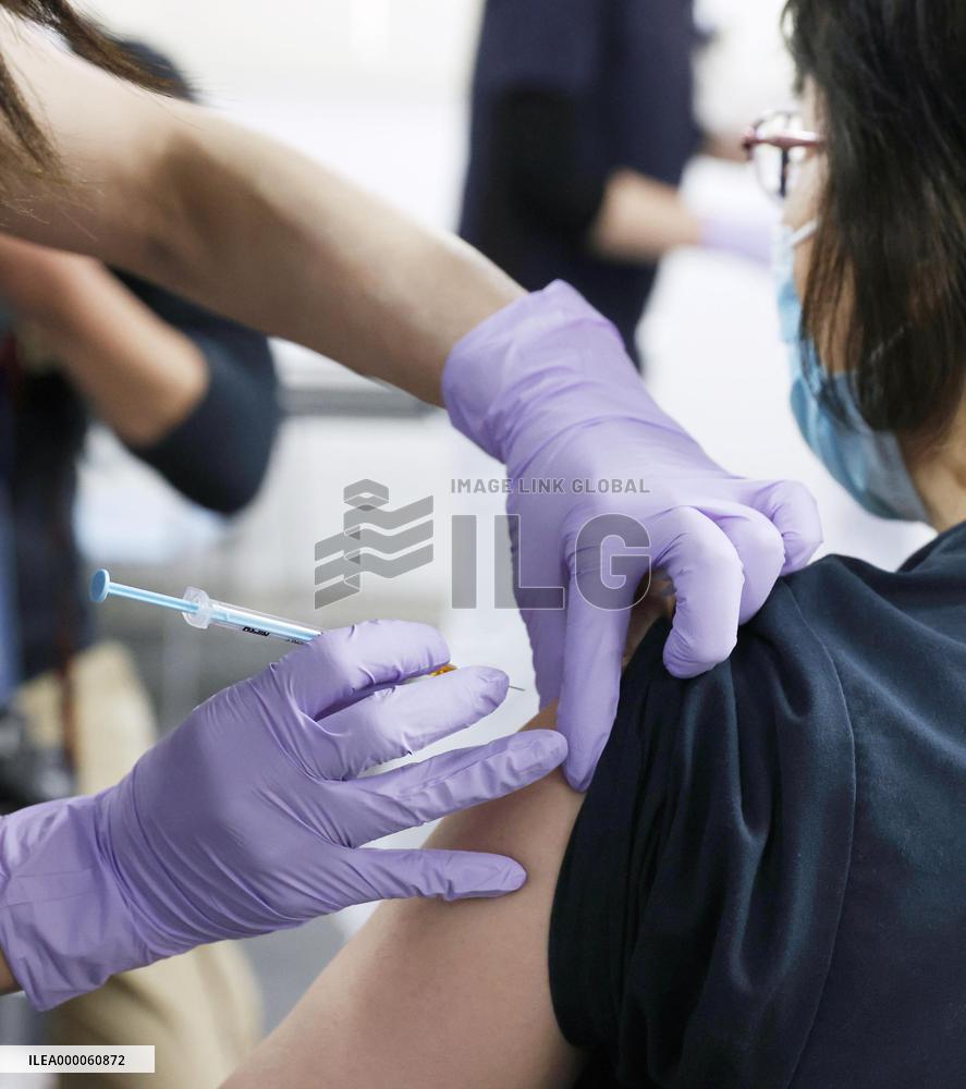 Japan launches COVID-19 vaccinations