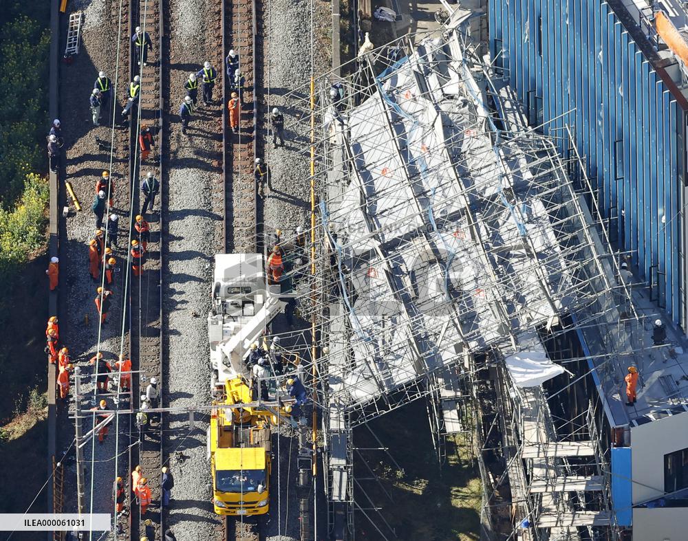 Scaffolding collapse alongside railway tracks in Tokyo