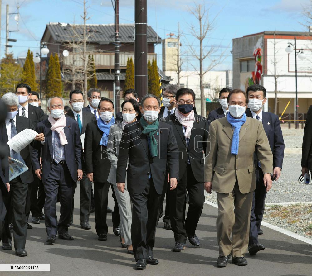 Japan PM Suga in nuclear crisis-hit Fukushima town