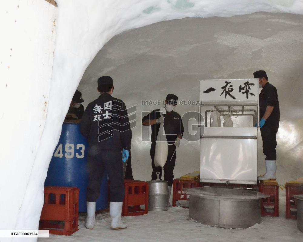 Fresh rice wine squeezed out in Hokkaido ice dome