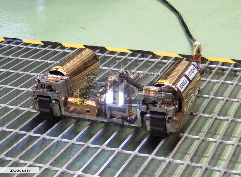 New robot unveiled for probing reactor gear at Fukushima station