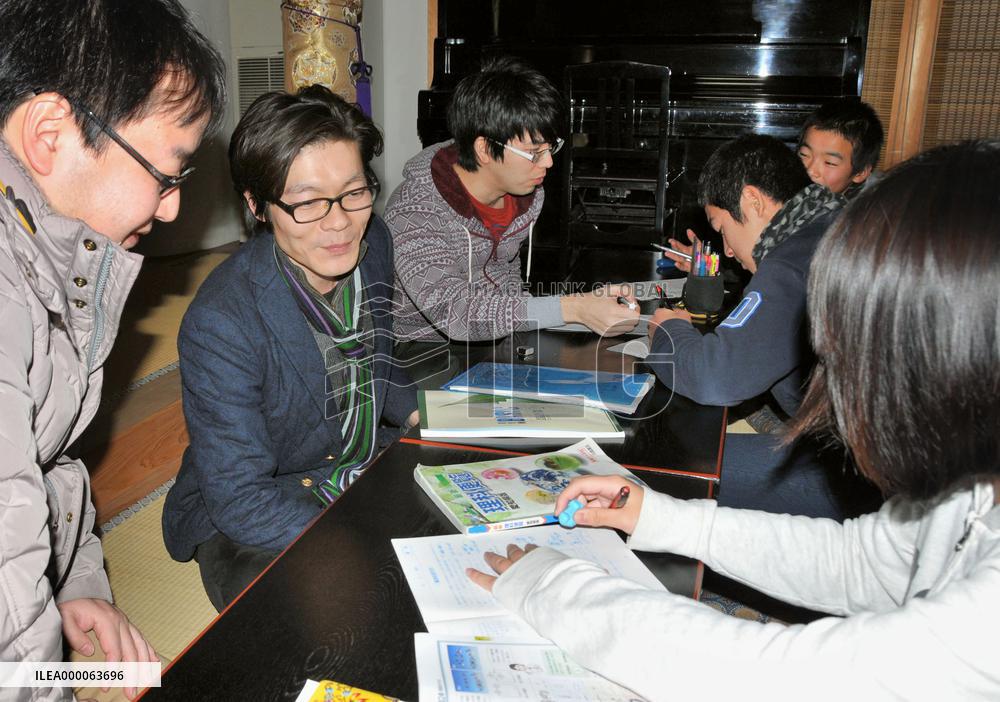 Nagoya temple allows kids from poor families to study in hall