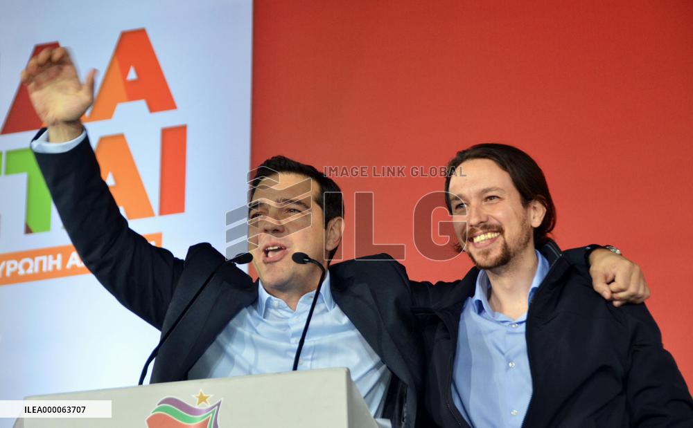 Leaders of Greek, Spanish far-left parties wave to supporters