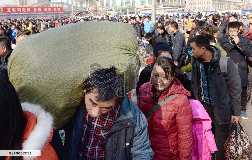 People returning home for Chinese Lunar New Year