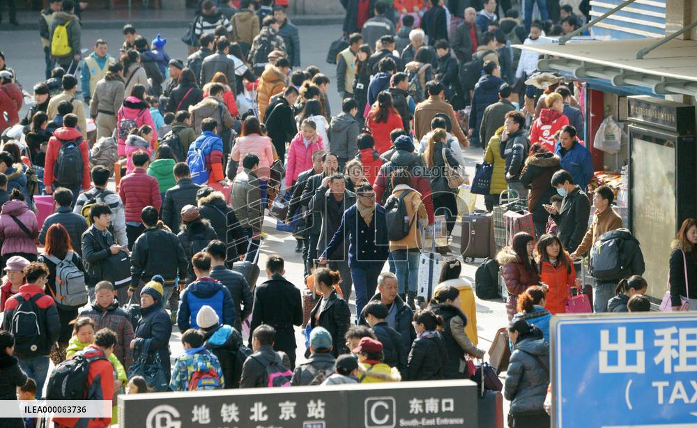 People returning home for Chinese Lunar New Year