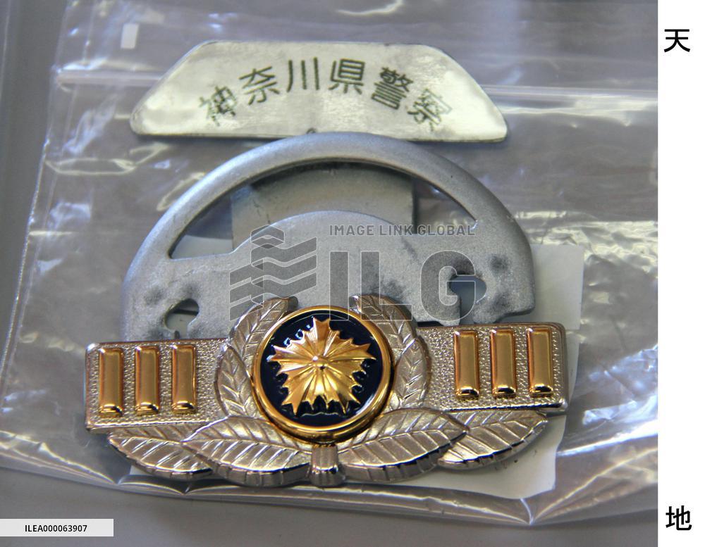 Confiscated fake police rank badge displayed in Yokohama