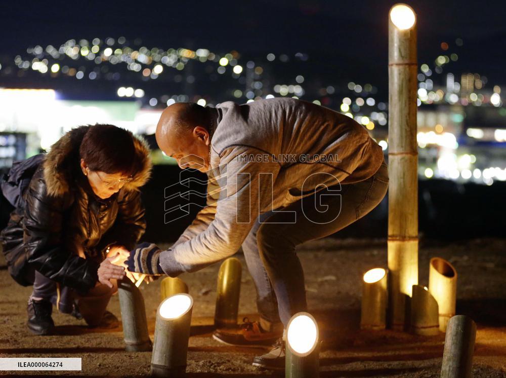 People mourn August 2014 Hiroshima landslide victims