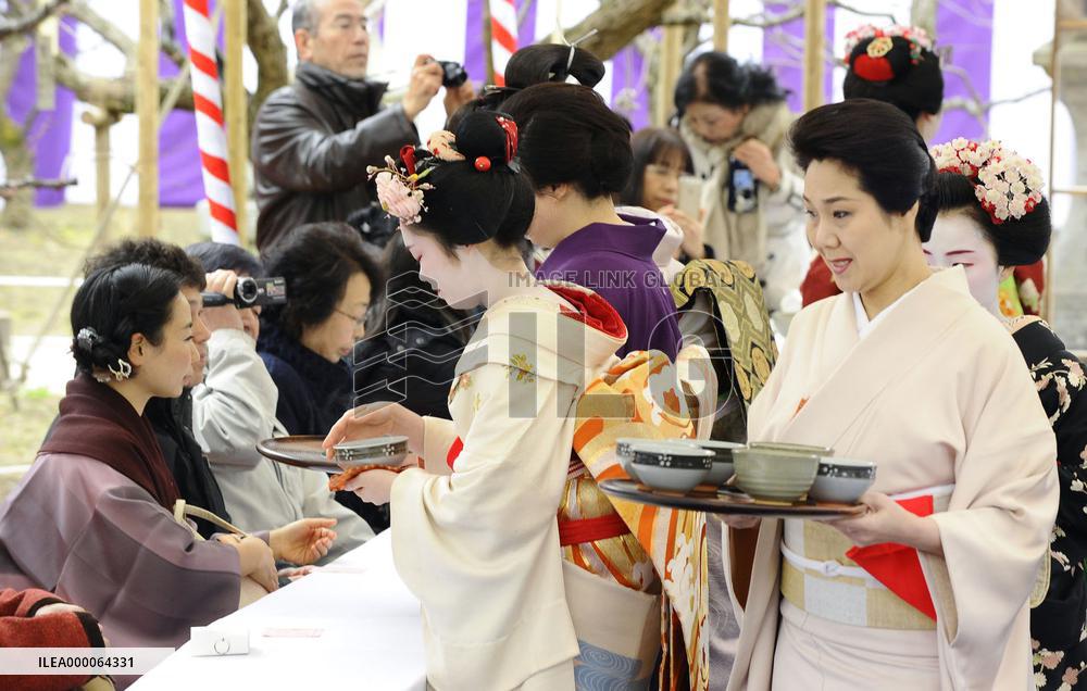 Geisha welcome visitors to plum blossom festival